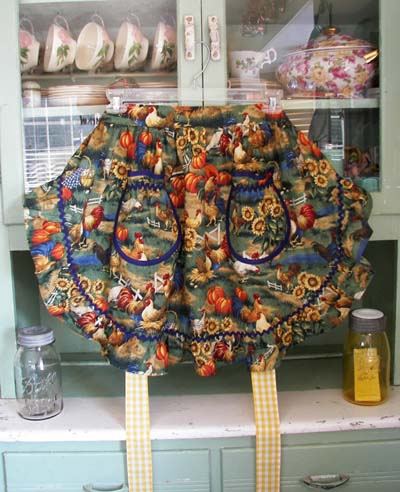 1948 Ruffle Apron in Chicken garden, click for more 1948 ruffle aprons in our other pretty material