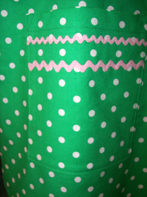 Close Up of Green Polka dot with pink ric rac